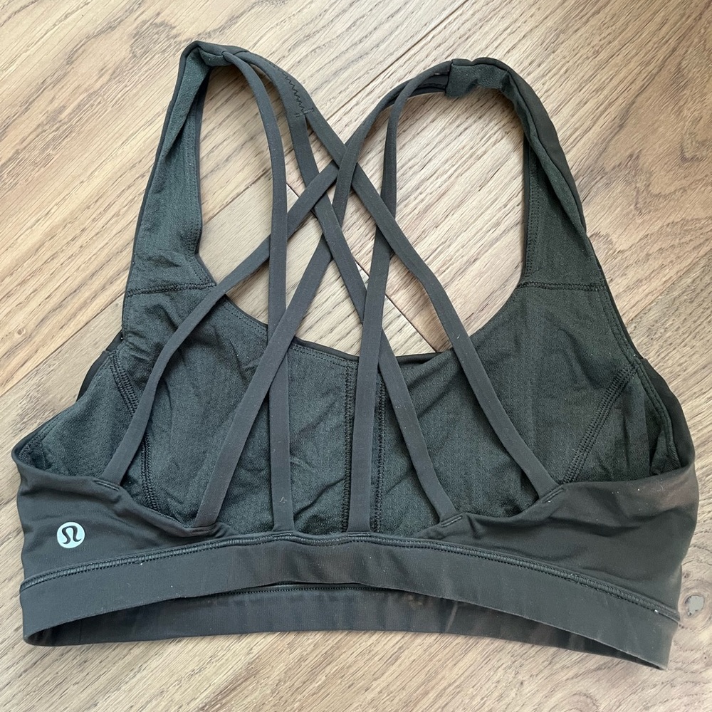 Olive green Lululemon strappy sports bra.